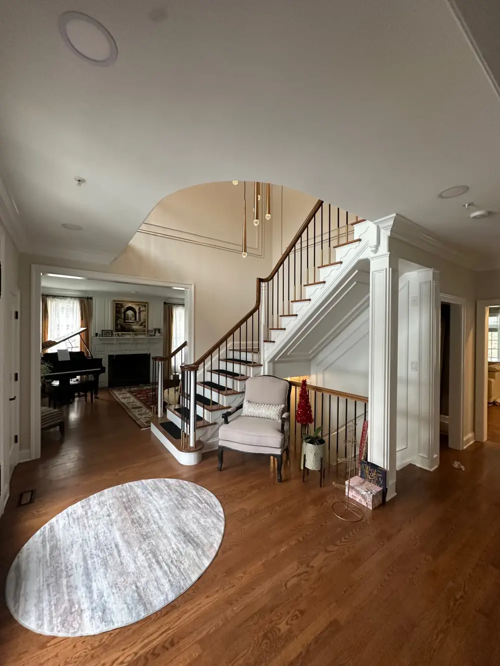 Grand curved staircase — premium interior painting Doylestown, PA